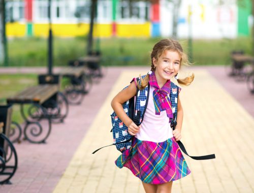 cheerful-girl-with-a-backpack-and-in-a-school-unif-2022-01-11-04-35-08-utc